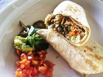 Hungry? Try our BIG Hunger Burrito with strips of chicken, onion, capsicum, mushroom, cabbage, mozzarella in a tortilla wrap a la Mexicana. Served with guacamole. Vegetarian option available :)
.
.
.
.
#balirestaurants #restaurantpadangbai #padangbai #balilife #lifeinbali #thecolonialrestaurantbali #bighungerburrito #burrito #burritotime #burritolove #crispyveggies #lovefood #foodparadise #healthyfood #familyfriendly #disabledfriendly #vegetarianfood #veganoptions #coffeelove #ecorestaurant #localsourced #perfectlunch #pool #relax
