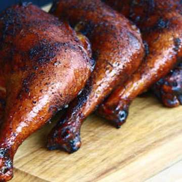 Succulent smoked Chicken quarters ready to eat. 
With all the NRL games live and free here @ Captains Table, I can’t forget the AFL games that are also playing.
Why not tuck into one of these while watching the games.
Tonight is Smoker night, with Smoked Brisket, Pulled Pork as well as the Chicken.
#thebalibible #mybalideals #smokedmeat #bossmanbali #soulonthebeachbali #nrl #afl #bali #balifood #foodporn #foodies