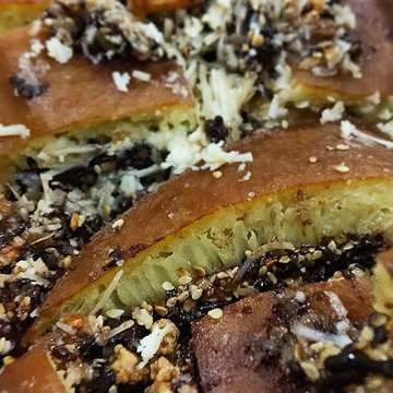 Chocolate, cheese, peanut, and sesame, topped with dough. The best sweet martabak in the city for new year's eve!